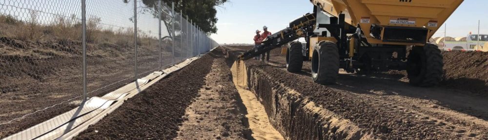 Rock slingers for a quicker trench sanding & backfill